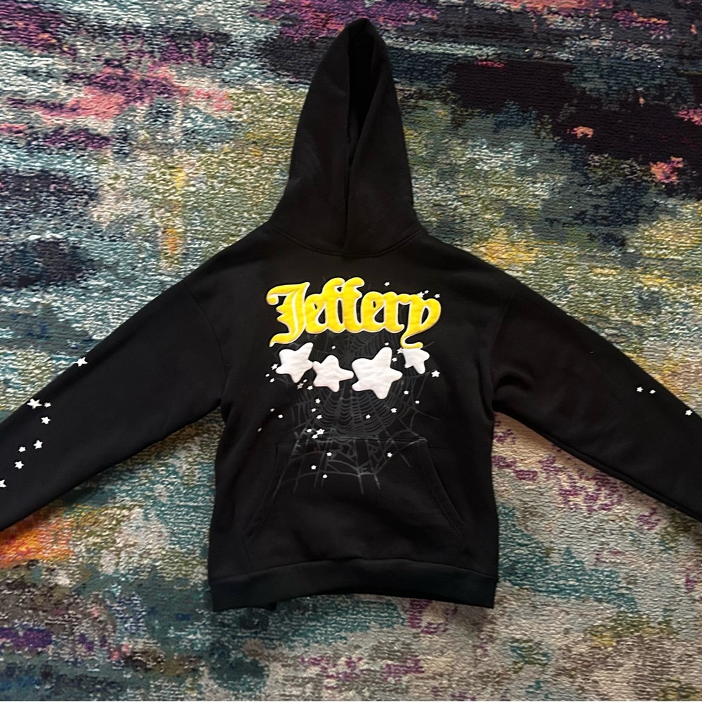 Black Hoodie with Yellow and White Star Design